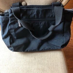 navy blue kipling handbag